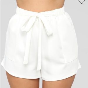 FASHION NOVA WHITE SHORTS. BRAND NEW.